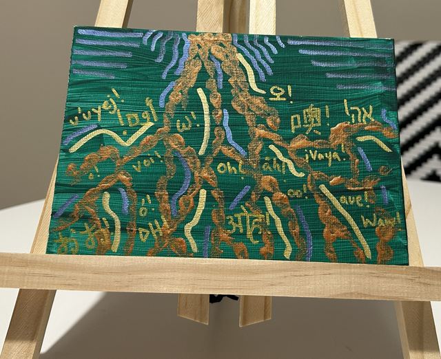 Green canvas with golden branching form threaded with greetings in many languages