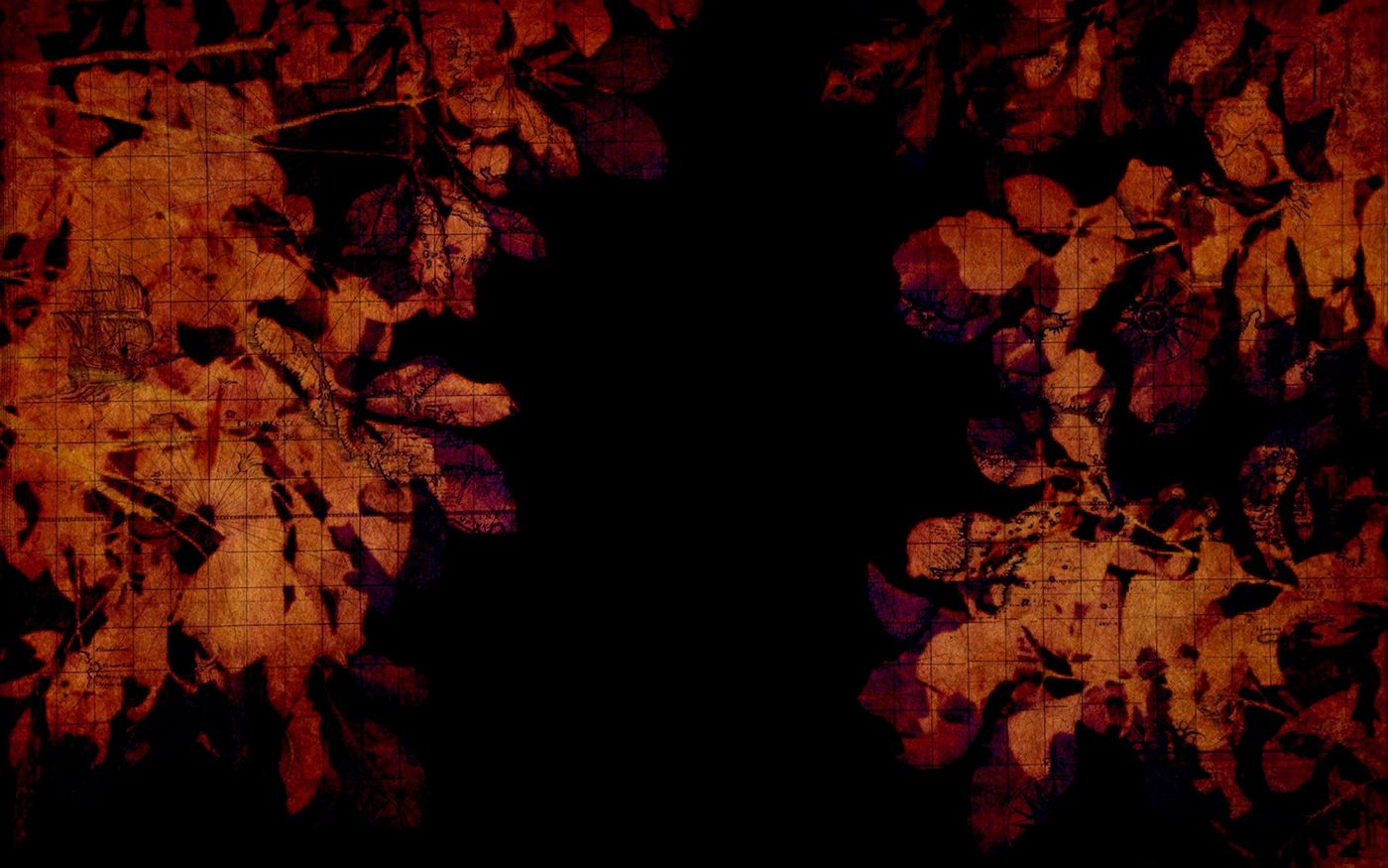 Dark textured photo edit of leaves in deep reds and oranges
