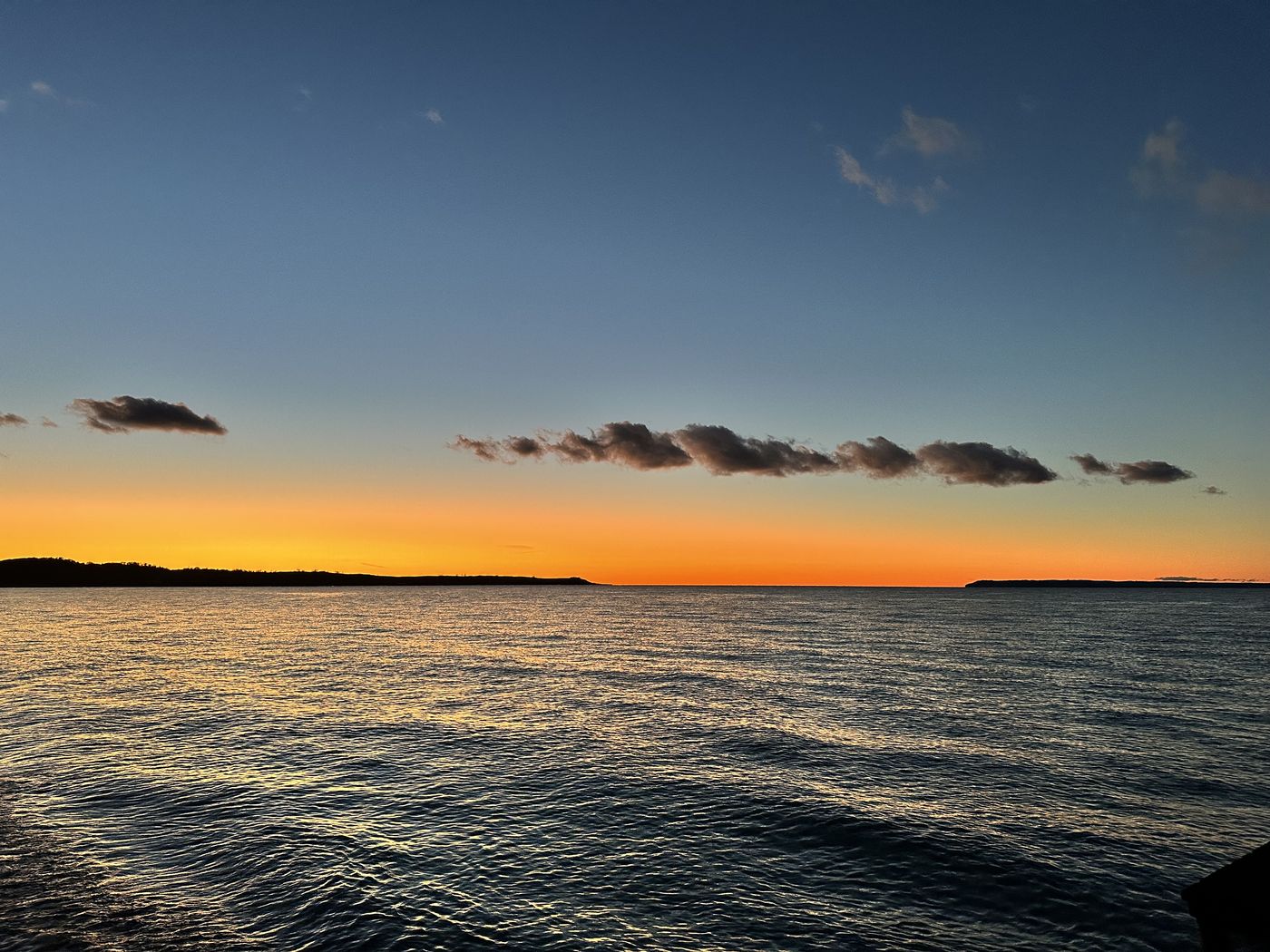 Sunset over the calm water of Sleeping Bear Bay